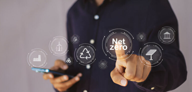 Digital interface showing 'Net Zero' concept with interconnected icons representing renewable energy, recycling, and sustainability, with a person touching the central 'Net Zero' button.