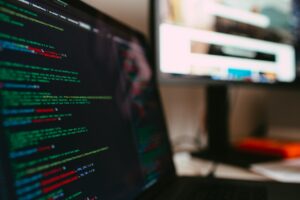 Close-up view of a coding environment with lines of programming language, representing the intricate process of creating digital applications.