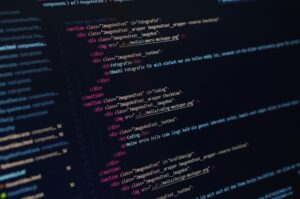 Close-up view of HTML code structure defining image and text components on a webpage