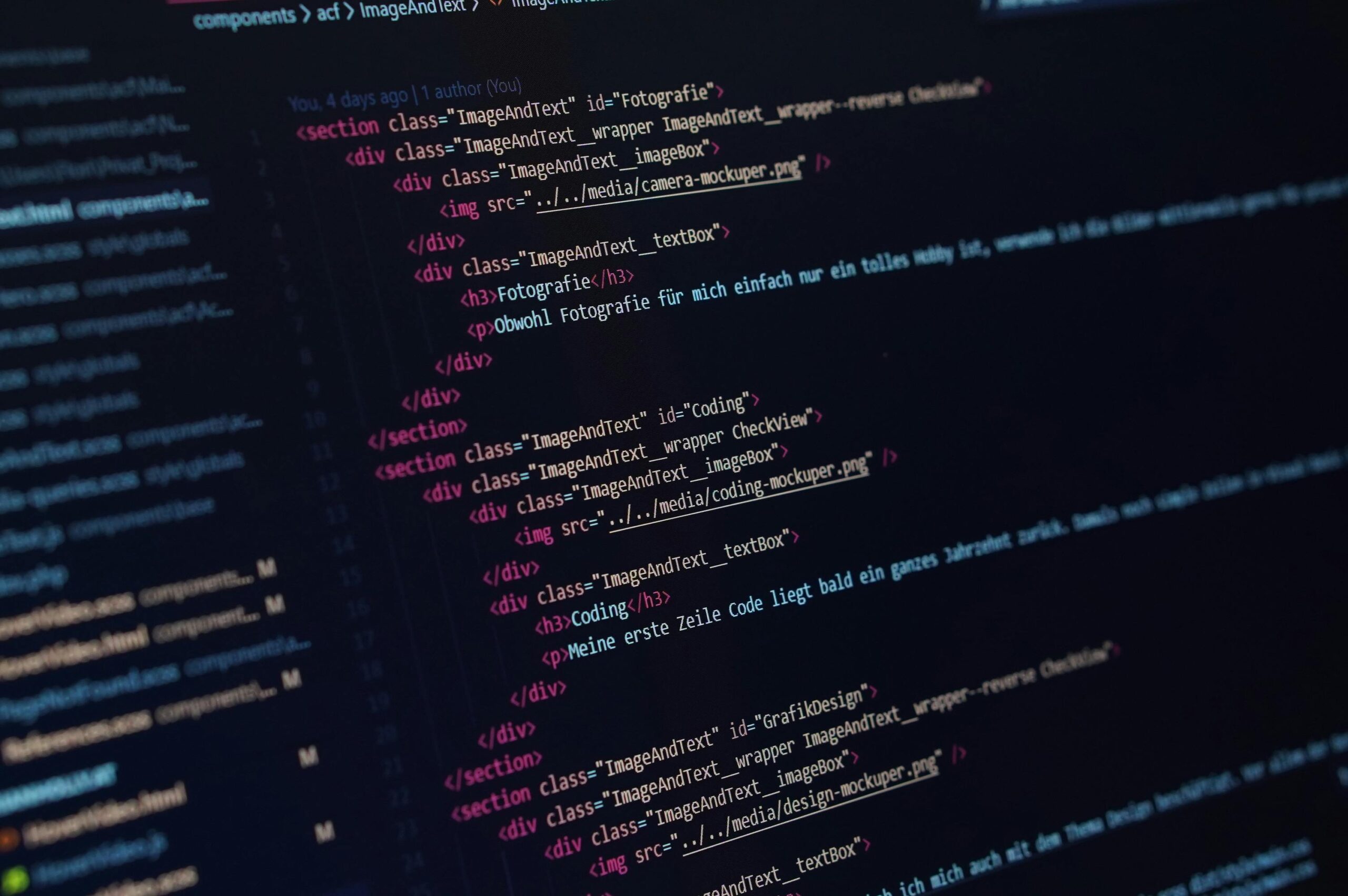 Close-up view of HTML code structure defining image and text components on a webpage