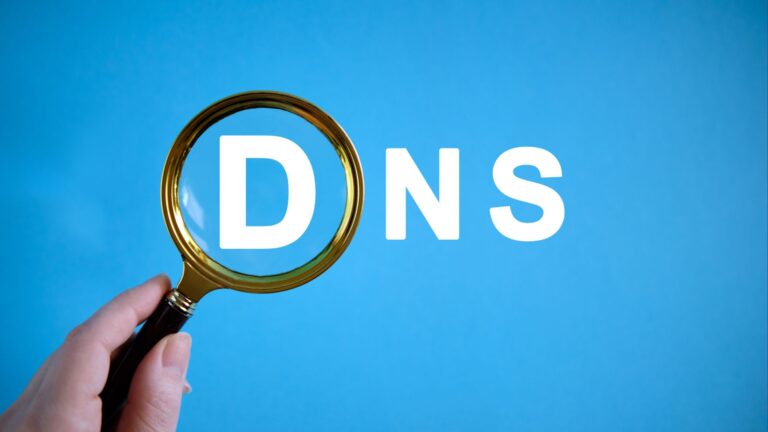 The image shows the word "DNS" in a magnifying glass, indicating the focus on detecting DNS spoofing.