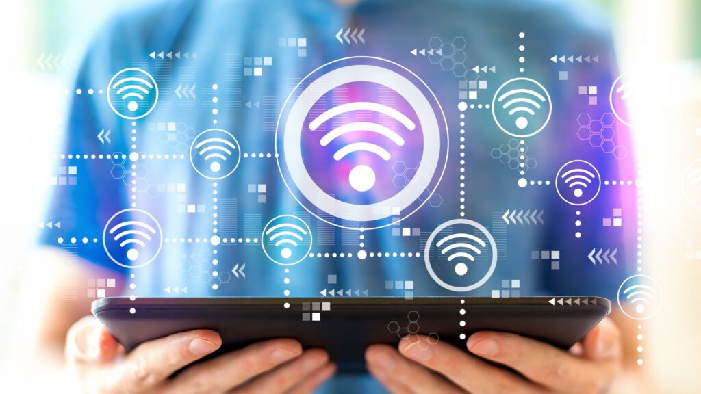 A laptop and several other electronic devices, hinting at the importance of maintaining updated software and separate network connections for safety.